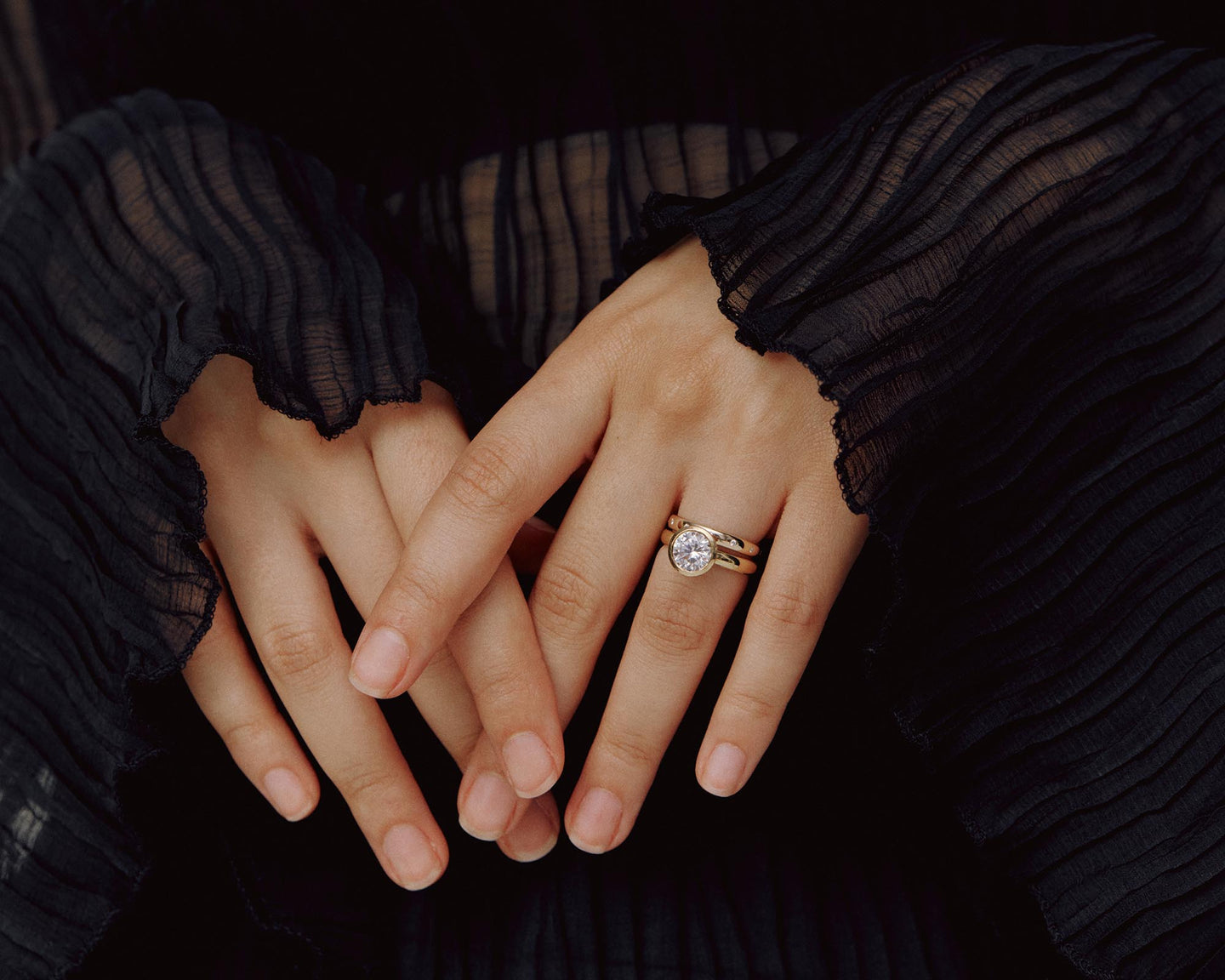 \ alt : Model wearing Holden's Royal Flush wedding band and the Domed Bezel Solitaire engagement ring with a round diamond. \ light \ diamond shape : round, width : 3mm, carat : 2.0 ct \ style : The Royal Flush, width : 3mm
